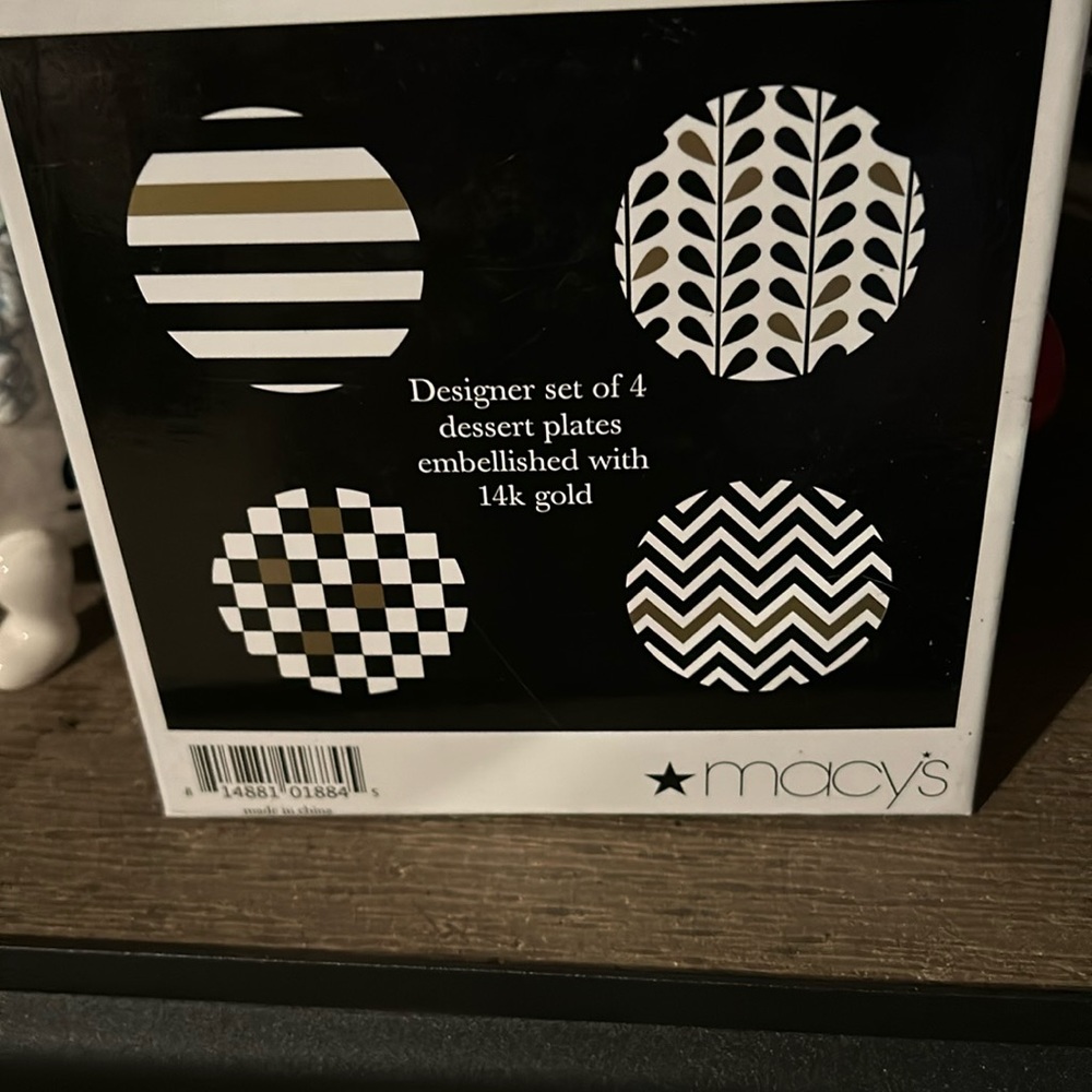 Designer set of 4 dessert plates.   Never opened.